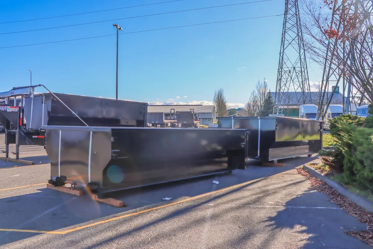 Roll-off dumpster ready for waste disposal at job site for 4 Yard Dumpster Rental in Dover